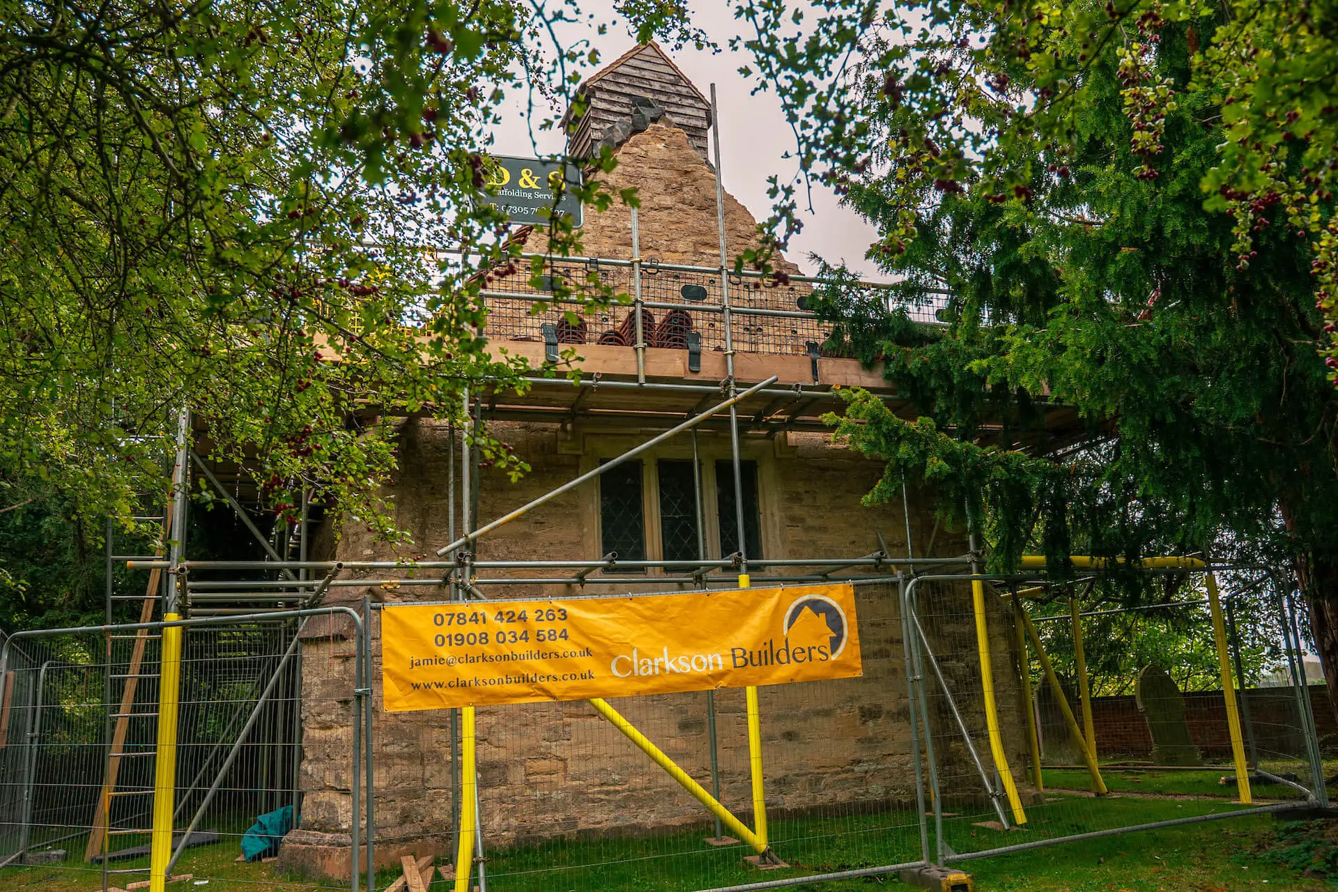 Storm-damaged pitched roof being inspected in Buckinghamshire.