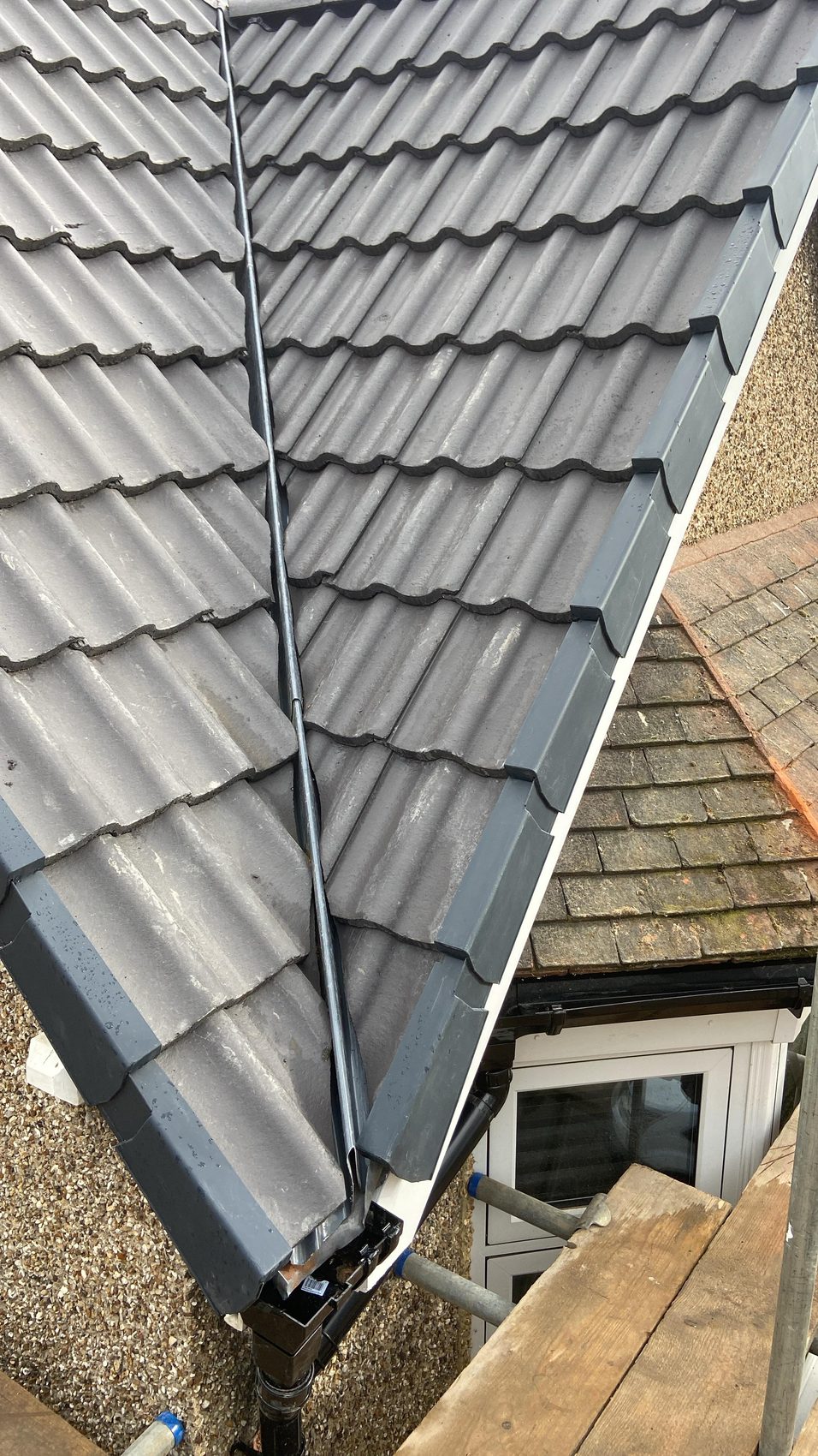 New white fascia, soffit and guttering along the eaves