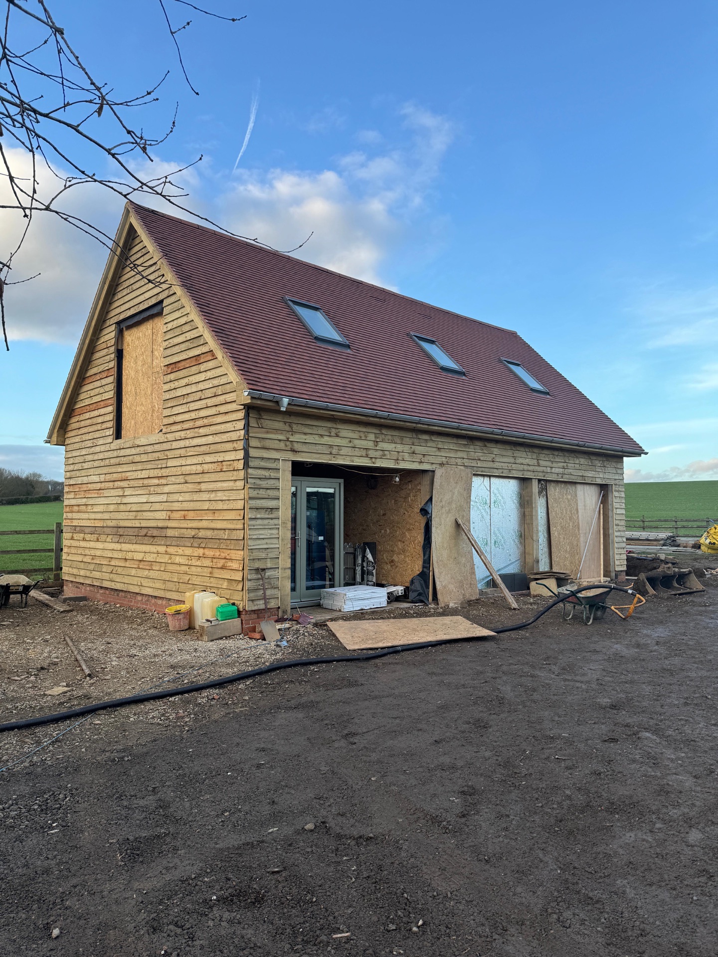 Finished residential new-build roof in clay tile