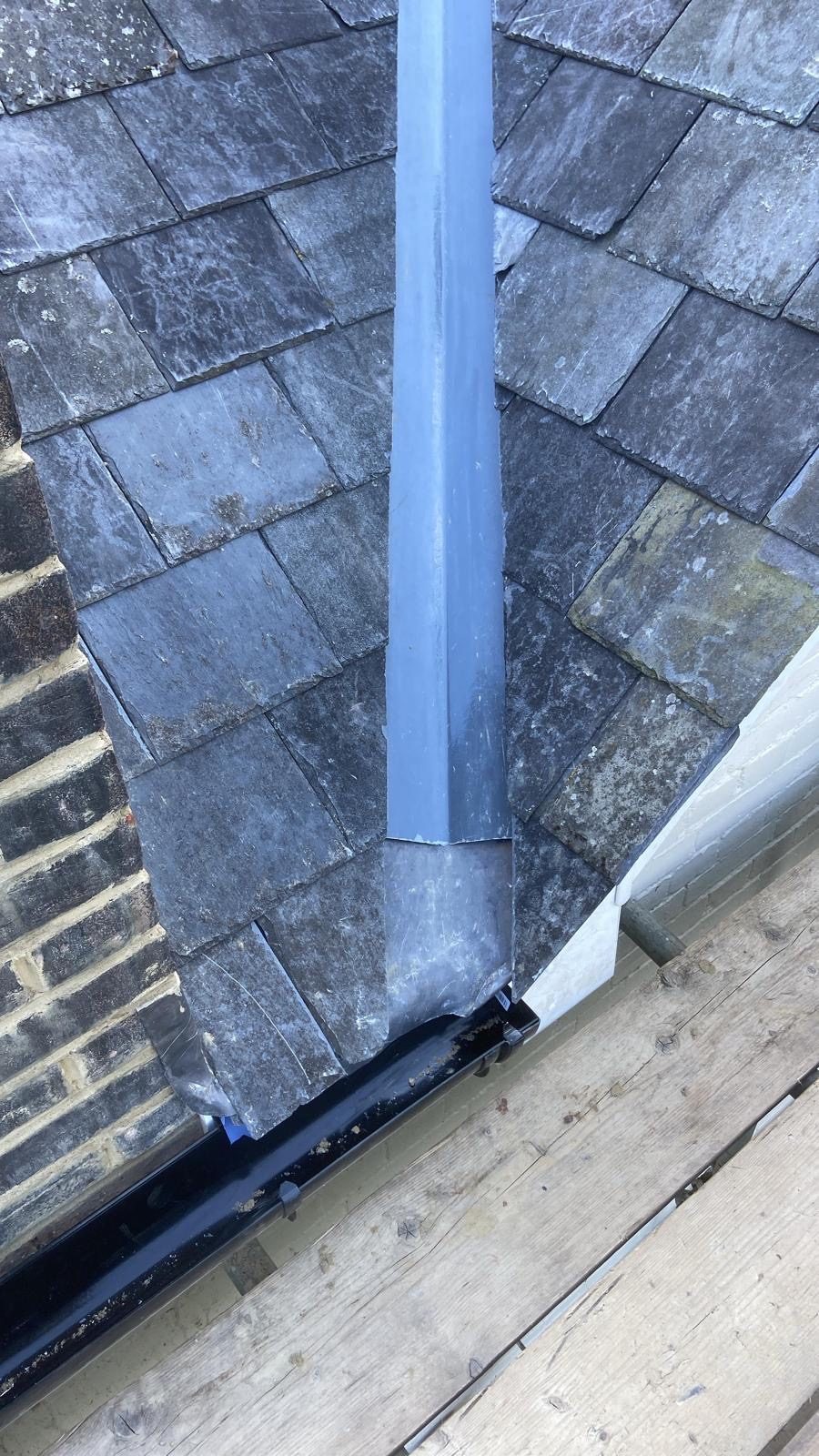 Lead valley and box gutter meeting the eaves gutter