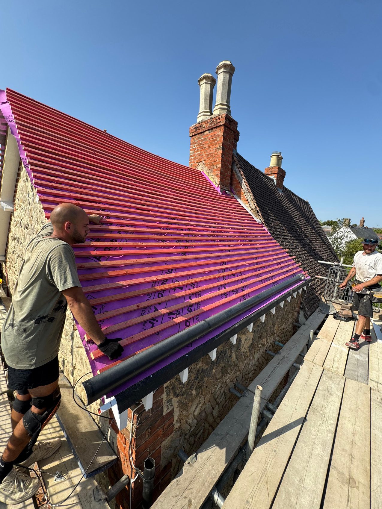 Breathable membrane and treated battens laid over the roof structure