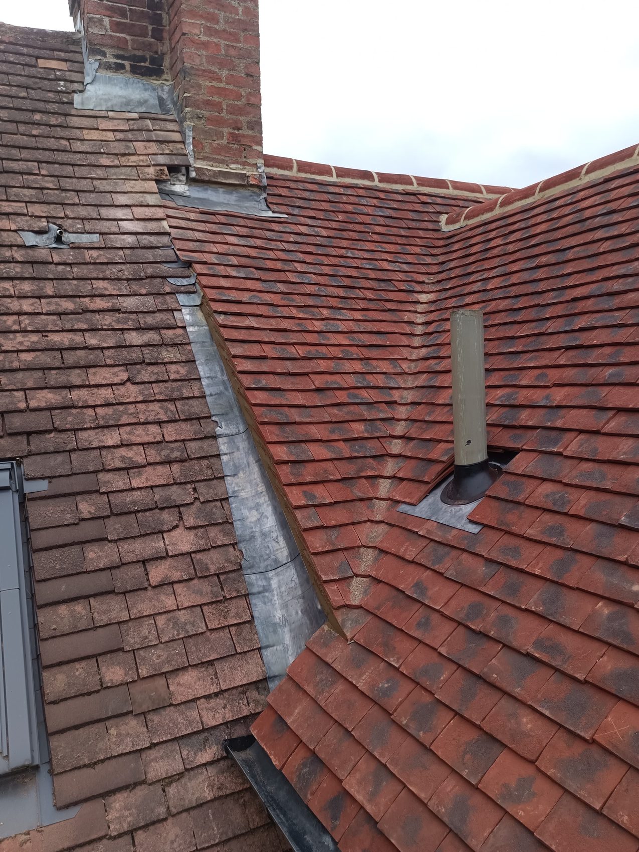 New lead valley and soil vent detail on the finished roof